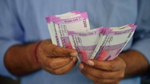 With rupee breaching 74, RBI offers $ for desi currency