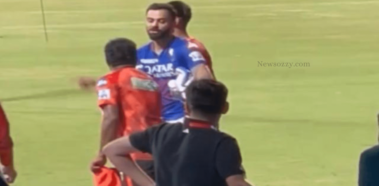 Virat Kohli interacts with Muttiah Muralitharan before RCB & SRH match